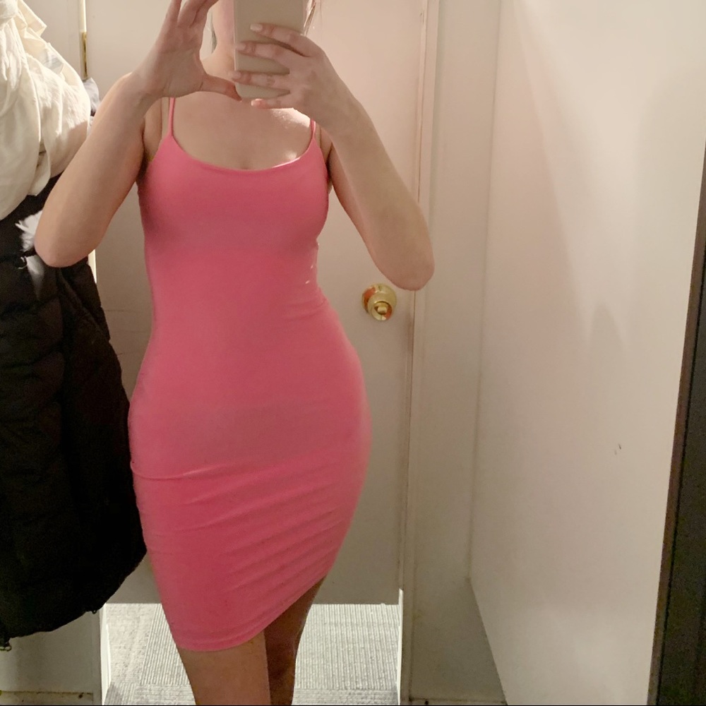 Tight neon pink mini dress